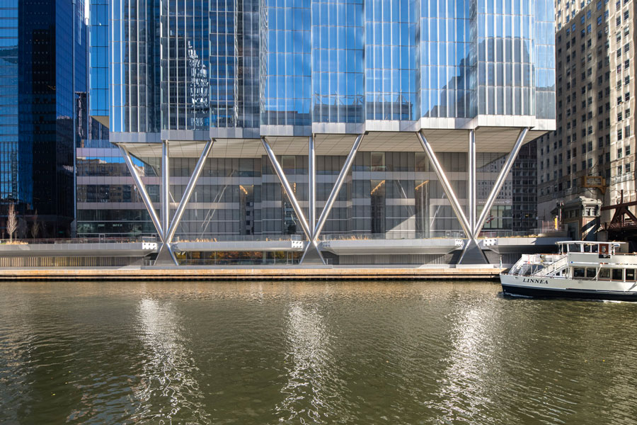 Exterior of the 110 N. Wacker building with the river in front of it.
